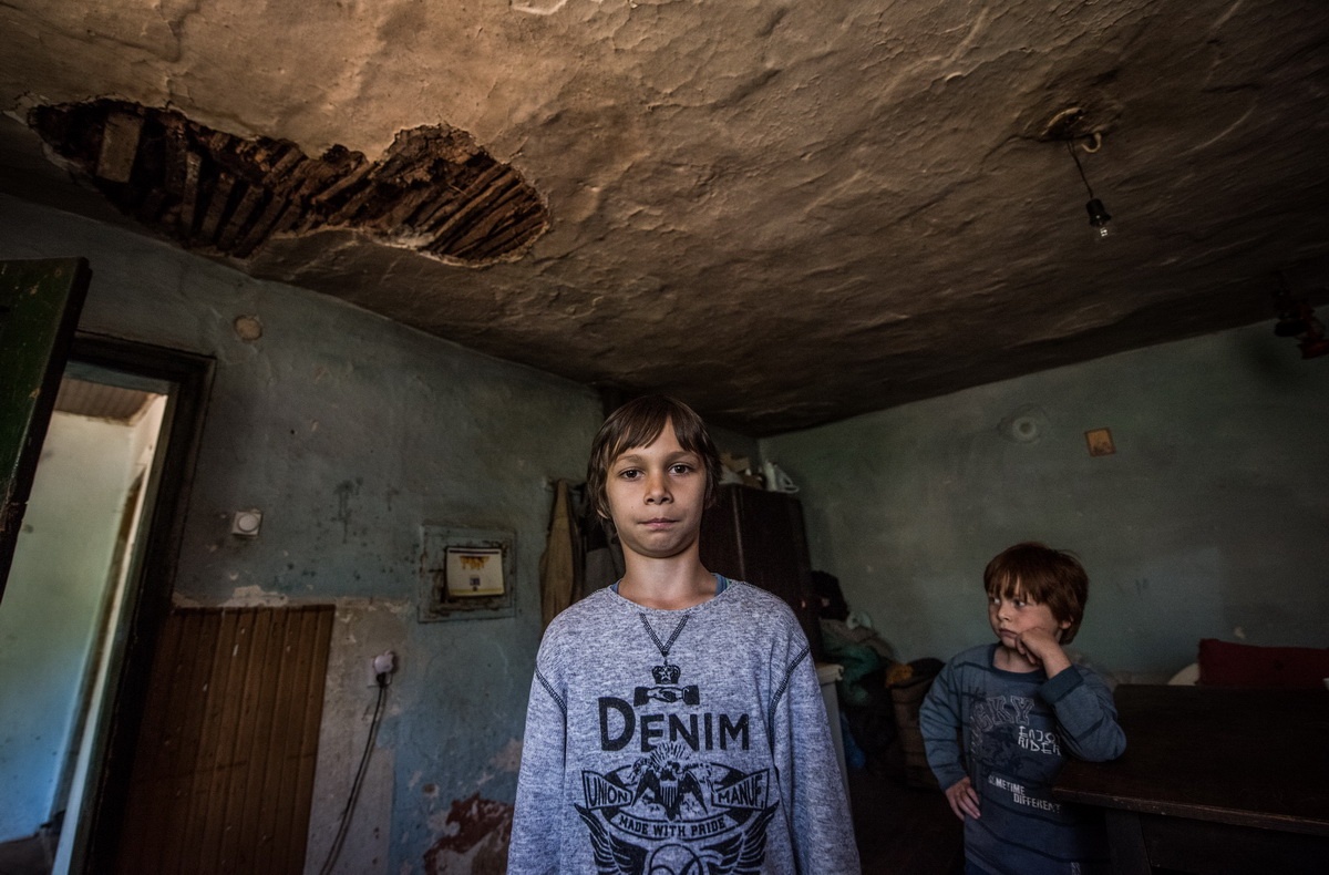  “Be careful, those are your only shoes” – children living in a 170 year old home with a big hole in the roof above their heads