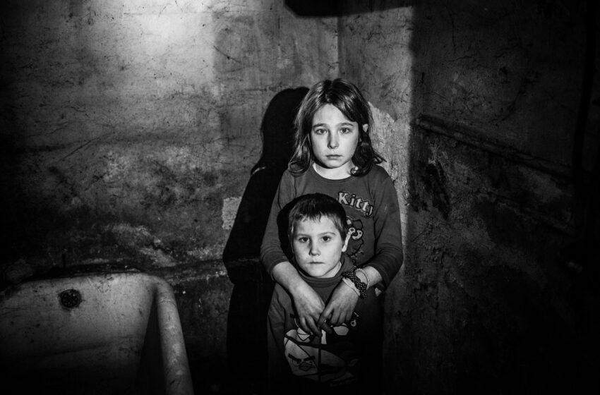  HOUSE OF FEAR AND HORROR: Zorica (10) and Zoran (5) awaiting Christmas shivering in a house with no electricity!