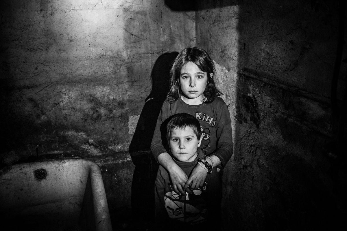 HOUSE OF FEAR AND HORROR: Zorica (10) and Zoran (5) awaiting Christmas shivering in a house with no electricity!